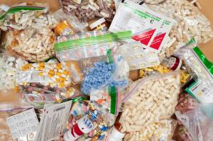 Prescriptions drugs, vitamins, hormones, and other drugs left in the drug drop box in the lobby of the Juneau Police Department displayed on Thursday, Sept. 26. The drop box gives residents a safe place to disposed of their unused prescription narcotics. (Michael Penn | Juneau Empire)