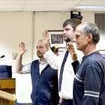 Victoria Petersen / Peninsula Clarion                                Newly elected assembly members Tyson Cox, Jesse Bjorkman and Brent Johnson are sworn in during Tuesdays Kenai Peninsula Borough Assembly meeting in Soldotna.