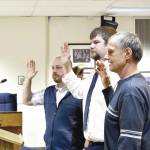 Newly elected assembly members Tyson Cox (left), Jesse Bjorkman (center) and Brent Johnson are sworn in during Tuesdays Kenai Peninsula Borough Assembly meeting, Tuesday, Oct. 8, 2019, in Soldotna, Alaska. (Photo by Victoria Petersen/Peninsula Clarion)