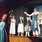 The youth cast of Frozen Jr. rehearse a scene Wednesday, Oct. 9, 2019, at the Triumvirate North theater in Kenai, Alaska. (Photo by Joey Klecka/Peninsula Clarion)