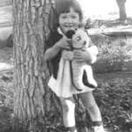 Photo courtesy Ann Berg                                Grannie Annies sister, Ginger, can be seen holding her teddy bear in this photo taken in June, 1945.