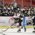 Kenai River Brown Bears defenseman Preston Weeks moves the puck up the ice against the Janesville (Wisconsin) Jets on Friday, Oct. 11, 2019, at the Soldotna Regional Sports Complex in Soldotna, Alaska. (Photo by Jeff Helminiak/Peninsula Clarion)