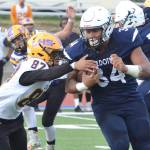 Soldotnas Aaron Faletoi (right) shakes off the tackle of Lathrops Jamaal Blanchard-Davis Friday, Sept. 13, 2019, at Justin Maile Field in Soldotna, Alaska. (Photo by Joey Klecka/Peninsula Clarion)