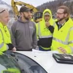 Courtesy photo                                HEA Land Management Officer Cody Neuendorf and Mike Hill, Kenai Wildlife Refuge assistant fire management officer, brief a clearing contractor on fire-related hazards at the S/Q Line Right of Way in this undated photo.