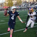 Soldotnas Jersey Truesdell looks for an open receiver Saturday, Oct. 19, 2019, against Lathrop at the Div. II state football championship at Anchorage Football Stadium in Anchorage, Alaska. (Photo by Joey Klecka/Peninsula Clarion)