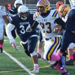 Lathrops Dario Ayala evades the tackle from Soldotnas Aaron Faletoi, Saturday, Oct. 19, 2019, at the Div. II state football championship at Anchorage Football Stadium in Anchorage, Alaska. (Photo by Joey Klecka/Peninsula Clarion)