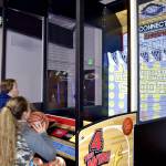 Victoria Petersen / Peninsula Clarion                                Children shoot hoops Wednesday in the newly opened Kenai Extreme Fun Center in Kenai.