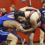 Kenais Zach Halstead grapples with Soldotnas Josh Hall, Saturday, Oct 26, 2019, at the Luke Spruill Memorial Tournament at Kenai Central High School in Kenai, Alaska. (Photo by Joey Klecka/Peninsula Clarion)