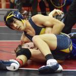 Homers Russell Nyvall grabs Soldotnas Peyton Lawton in a headlock Saturday, Oct 26, 2019, at the Luke Spruill Memorial Tournament at Kenai Central High School in Kenai, Alaska. (Photo by Joey Klecka/Peninsula Clarion)