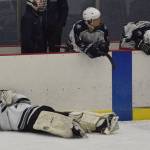 Members of the Soldotna hockey team react Friday after losing to Palmer in overtime in a state semifinal contest at the Curtis Menard Sports Complex in Wasilla. (Photo by Joey Klecka/Peninsula Clarion)