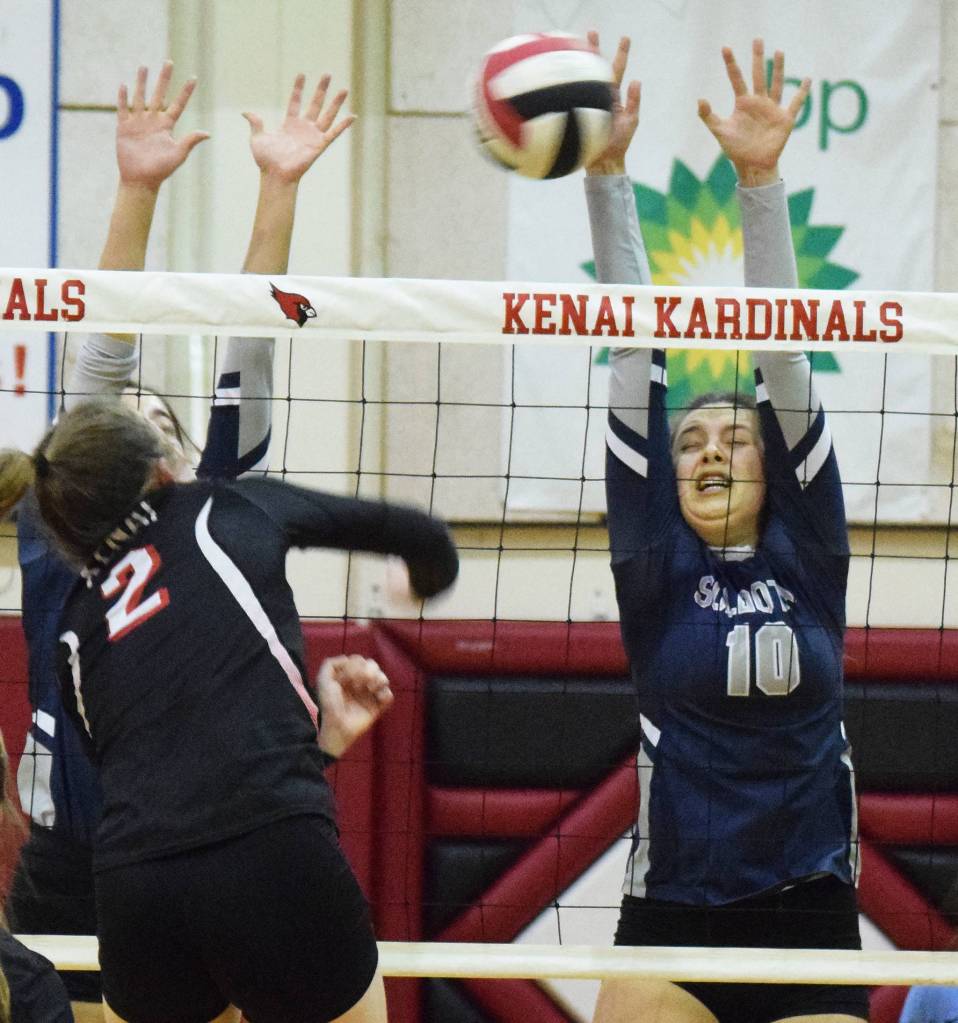 Soldotnas Trayce Lyon puts up a block on Kenai hitter Bethany Morris Thursday, Oct. 31, 2019, at Kenai Central High School in Kenai, Alaska. (Photo by Joey Klecka/Peninsula Clarion)