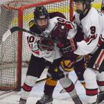 Kenais Jordyn Stock (left) puts Dimonds Preston Horschel in a headlock Friday, Nov. 1, 2019, at the Peninsula Ice Challenge tournament at the Kenai Multi-Purpose Facility in Kenai, Alaska. (Photo by Joey Klecka/Peninsula Clarion)