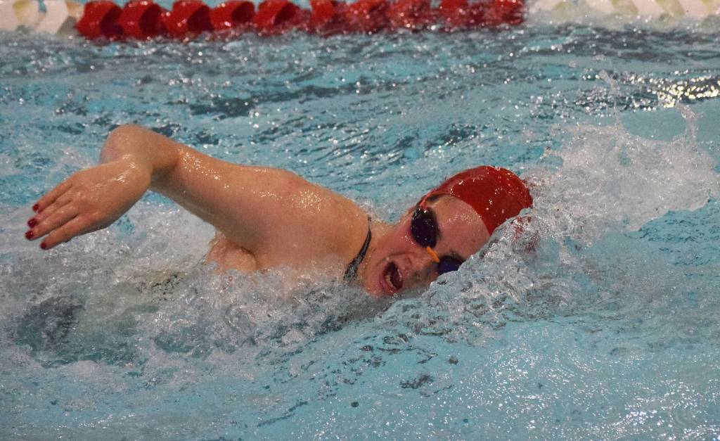 Kenais Rachael Pitsch comes up for air in the girls 200-yard freestyle final Saturday, Nov. 2, 2019, at the Northern Lights Conference swimming and diving championships at Kenai Central High School. (Photo by Joey Klecka/Peninsula Clarion)