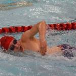 Kenais Koda Poulin races in the boys 500-yard freestyle event Saturday, Nov. 2, 2019, at the Northern Lights Conference swimming and diving championships at Kenai Central High School. (Photo by Joey Klecka/Peninsula Clarion)