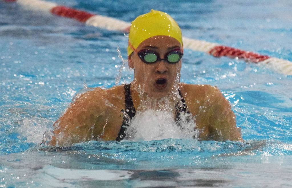 Homers Madison Story races in the girls 100-yard breaststroke final Saturday, Nov. 2, 2019, at the Northern Lights Conference swimming and diving championships at Kenai Central High School. (Photo by Joey Klecka/Peninsula Clarion)