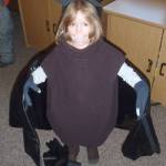 A brave volunteer dressed up in a bat costume to help peers visualize the anatomy of a bat resulted in an unusual question. (Photo provided by Kenai National Wildlife Refuge)