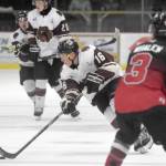 Kenai River Brown Bears forward Theo Thrun brings the puck up the ice on Friday, Oct. 18, 2019, against the Minnesota Magicians at the Soldotna Regional Sports Complex in Soldotna, Alaska. (Photo by Jeff Helminiak/Peninsula Clarion)