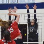 Soldotnas Trayce Lyon (right) puts up a block on Wasillas Bella Hays, Thursday, Nov. 7, 2019, at the Northern Lights Conference tournament at Soldotna High School in Soldotna, Alaska. (Photo by Joey Klecka/Peninsula Clarion)