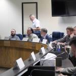 Representatives from local, state and federal agencies participate in a discussion about the Swan Lake Fire at the Kenai Peninsula Borough Assembly Chambers in Soldotna, Alaska on Nov. 13, 2019. (Photo by Brian Mazurek/Peninsula Clarion)