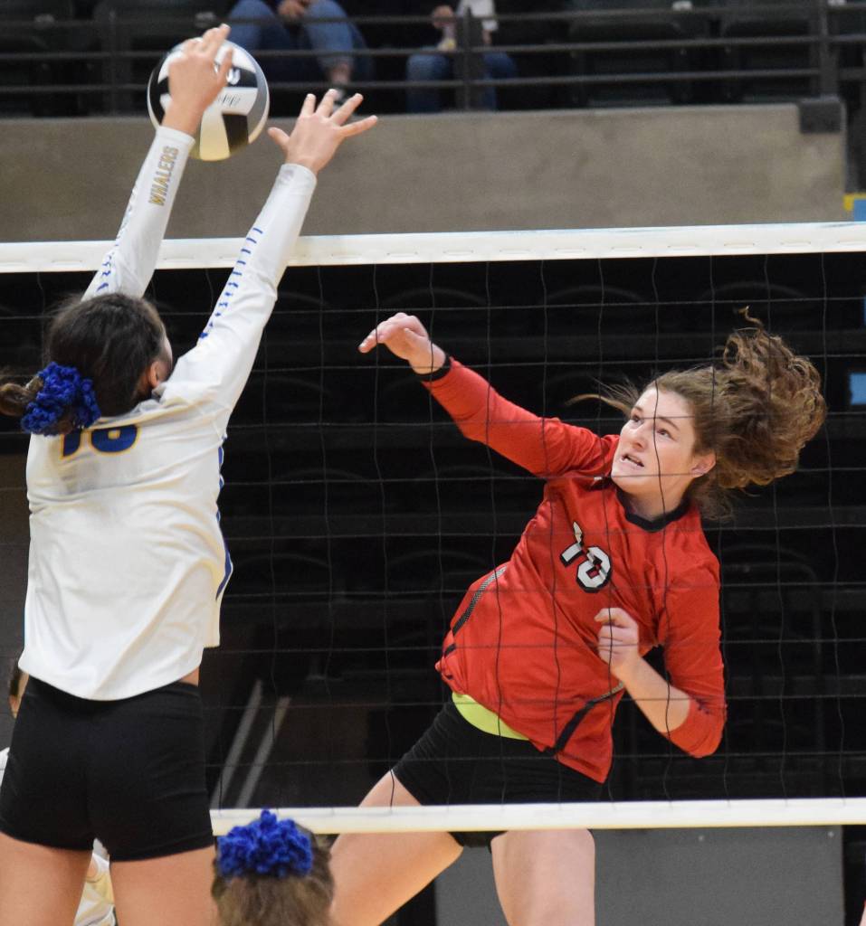 Kenais Abby Every sends a ball over the net Thursday, Nov. 14, 2019, against Barrow at the Class 3A state volleyball tournament at the Alaska Airlines Center in Anchorage, Alaska. (Photo by Joey Klecka/Peninsula Clarion)