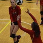 Kenais Erin Koziczkowski watches as teammate Bethany Morris sets up a shot Thursday, Nov. 14, 2019, against Barrow at the Class 3A state volleyball tournament at the Alaska Airlines Center in Anchorage, Alaska. (Photo by Joey Klecka/Peninsula Clarion)