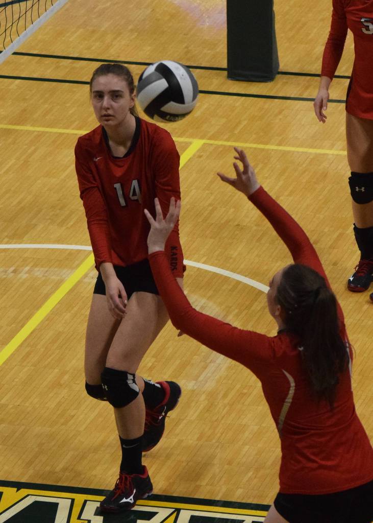 Kenais Erin Koziczkowski watches as teammate Bethany Morris sets up a shot Thursday, Nov. 14, 2019, against Barrow at the Class 3A state volleyball tournament at the Alaska Airlines Center in Anchorage, Alaska. (Photo by Joey Klecka/Peninsula Clarion)