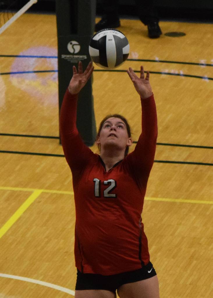Kenais Kaylee Lauritsen sets up a shot Thursday, Nov. 14, 2019, against Barrow at the Class 3A state volleyball tournament at the Alaska Airlines Center in Anchorage, Alaska. (Photo by Joey Klecka/Peninsula Clarion)