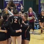 Kenai Central players celebrate after defeating Nikiski in a semifinal match Friday, Nov. 15, 2019, at the Class 3A state volleyball tournament at the Alaska Airlines Center in Anchorage, Alaska. (Photo by Joey Klecka/Peninsula Clarion)