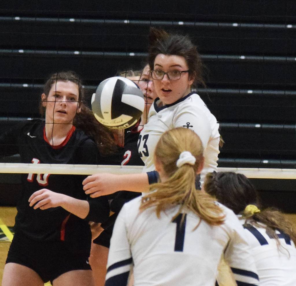 Homers Tonda Smude looks back at the ball Saturday, Nov. 16, 2019, against Kenai Central at the Class 3A state volleyball tournament at the Alaska Airlines Center in Anchorage, Alaska. (Photo by Joey Klecka/Peninsula Clarion)