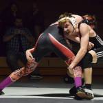 Nikiskis Yorik Bastuck grapples with Kenais Isaiah Ticknor, Tuesday, Nov. 19, 2019, at a Kenai/Nikiski dual meet at Nikiski High School. (Photo by Joey Klecka/Peninsula Clarion)