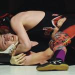 Nikiskis Yorik Bastuck attempts to slip out of a hold by Kenais Isaiah Ticknor, Tuesday, Nov. 19, 2019, at a Kenai/Nikiski dual meet at Nikiski High School. (Photo by Joey Klecka/Peninsula Clarion)