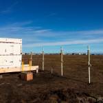 This undated photo in Kaktovik, Alaska, shows a shelter covering the entrance to a new community ice cellar, a type of underground food cache dug into the permafrost to provide natural refrigeration used for generations in far-north communities. Naturally cooled underground ice cellars, used in Alaska Native communities for generations, are becoming increasingly unreliable as a warming climate and other factors touch multiple facets of life in the far north. (Marnie Isaacs/Kaktovik Community Foundation via AP)