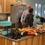 Residents of the Kenai Intentional Neighborhood celebrate the completion of their clubhouse with friends, family and Hope Community Resources board members in Soldotna, Alaska on Nov. 22, 2019. (Photo courtesy Kathy Fitzgerald)