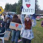 Shelby Sinn holds a sign Saturday, Nov. 23, 2019, at a vigil for Anesha Duffy Murnane, a Homer woman missing since Oct. 17, at WKFL Park in Homer, Alaska. Sinn helped organize the vigil. (Photo by Michael Armstrong/Homer News)