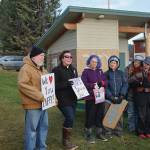 Homer United Methodist Church Pastor Lisa Talbott, third from left, leads a prayer Saturday, Nov. 23, 2019, at a vigil for Anesha Duffy Murnane, a Homer woman missing since Oct. 17, at WKFL Park in Homer, Alaska. (Photo by Michael Armstrong/Homer News)