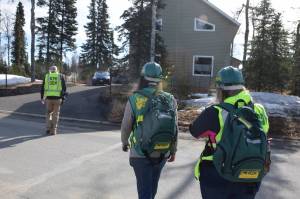 CERT volunteers go door to door while simulating a neighborhood evacuation in Kenai, Alaska, during OEMs Alaska Shield 2019 program on April 13, 2019. (Photo by Brian Mazurek/Peninsula Clarion)