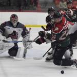 Kenai Rivers Zach Krajnik makes a play in front of the net Friday, Nov. 29, 2019, at the Soldotna Regional Sports Complex in Soldotna, Alaska. (Photo by Joey Klecka/Peninsula Clarion)