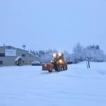 A heavy duty forklift travels on Kenais snowy streets after winter weather brought heavy snow to the western Kenai Peninsula on Sunday and Monday, on Monday, Dec. 2, 2019. (Photo by Victoria Petersen/Peninsula Clarion)