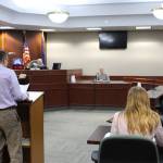 Nikiski Middle/High School senior Joseph Yourkoski, in his role as prosecutor, questions witness Cecily Quiner during a mock trial at the Kenai Courthouse on Dec. 3, 2019. (Photo by Brian Mazurek/Peninsula Clarion)