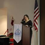 Project Homeless Connect Publicity Chair Jodi Stuart gives a presentation to the Kenai and Soldotna Chambers of Commerce at the Kenai Visitor and Cultural Center in Kenai, Alaska on Dec. 4, 2019. (Photo by Brian Mazurek/Peninsula Clarion)
