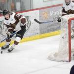 Kenai River Brown Bears forward Cody Moline carries the puck behind the net against the Springfield (Illinois) Jr. Blues on Friday, Nov. 15, 2019, at the Soldotna Regional Sports Complex. (Photo by Jeff Helminiak/Peninsula Clarion)