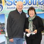 Chamber President Jim Stogsdill and Linda Hutchings smile for the camera at the Soldotna Chamber of Commerce Awards Luncheon at the Soldotna Regional Sports Complex on Dec. 11, 2019. (Photo by Brian Mazurek/Peninsula Clarion)