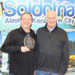 Paul Wright and Chamber President Jim Stogsdill smile for the camera at the Soldotna Chamber of Commerce Awards Luncheon at the Soldotna Regional Sports Complex on Dec. 11, 2019. (Photo by Brian Mazurek/Peninsula Clarion)