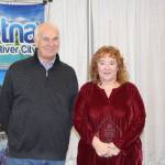 Chamber President Jim Stogsdill and Volunteer of the Year Terri Burdick smile for the camera at the Soldotna Chamber of Commerce Awards Luncheon at the Soldotna Regional Sports Complex on Dec. 11, 2019. (Photo by Brian Mazurek/Peninsula Clarion)