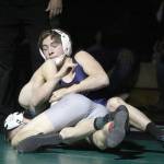 Soldotnas Scott Michael locks the arm of Palmers Aiden Corbridge during the 125-pound final of the Northern Lights Conference Championships Saturday, Dec. 14, 2019, at Colony High School. (Photo by Jeremiah Bartz/Frontiersman)