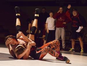 Nikiskis Yorik Bastuck grapples with Kenais Isaiah Ticknor, Tuesday, Nov. 19, 2019, at a Kenai/Nikiski dual meet at Nikiski High School. (Photo by Joey Klecka/Peninsula Clarion)