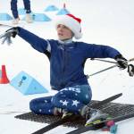 Soldotnas Quinn Cox shows off the shooting form the brought him first place in the Candy Cane Scramble on Friday, Dec. 20, 2019, at Tsalteshi Trails near Soldotna, Alaska. (Photo by Jeff Helminiak/Peninsula Clarion)