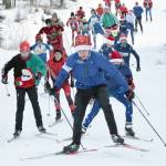 Soldotnas Jack Harris leads racers up the first hill in the Candy Cane Scramble on Friday, Dec. 20, 2019, at Tsalteshi Trails near Soldotna, Alaska. (Photo by Jeff Helminiak/Peninsula Clarion)
