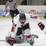 Soldotnas Jose Montague is called for a trip on Kenai Centrals Miles Marston on Friday, Dec. 20, 2019, at the Kenai Multi-Purpose Facility in Kenai, Alaska. (Photo by Jeff Helminiak/Peninsula Clarion)