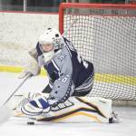 Soldotna goaltender Josh Tree makes a save against Kenai Central on Friday, Dec. 20, 2019, at the Kenai Multi-Purpose Facility in Kenai, Alaska. (Photo by Jeff Helminiak/Peninsula Clarion)